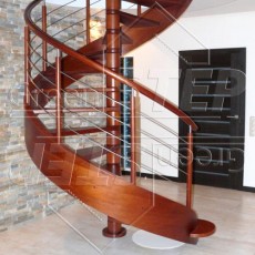 Omega – Spiralne schody drewniane ze stylizowanym policzkiem giętym